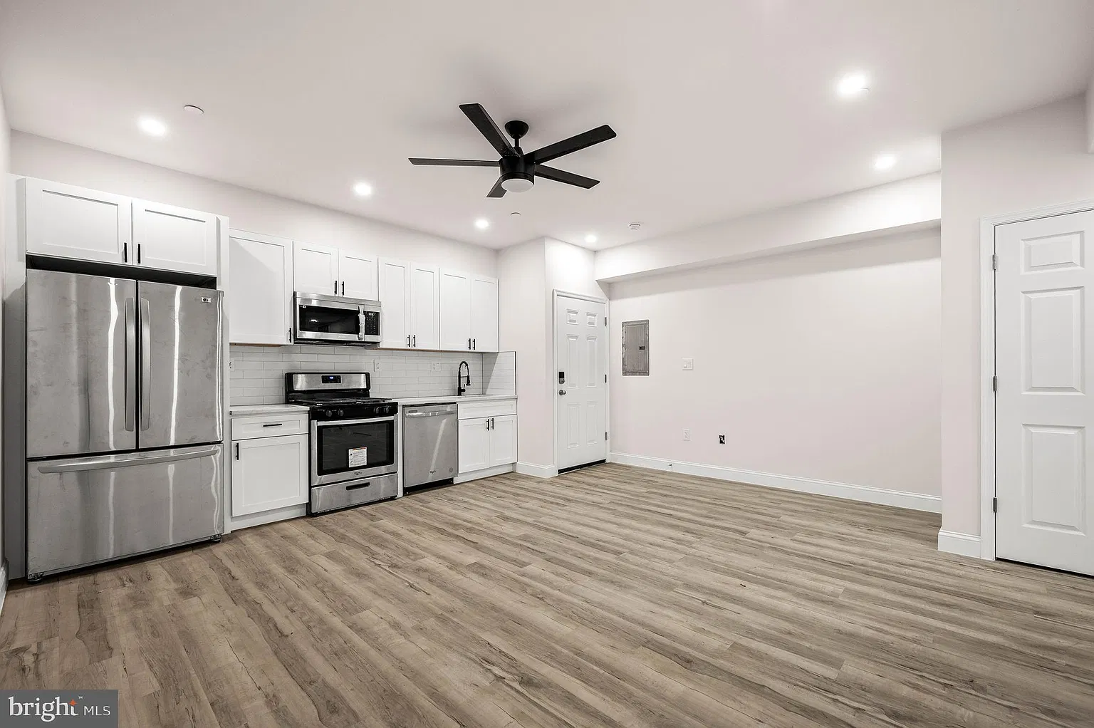 Renovated kitchen and living area at 437–39 W Girard Ave